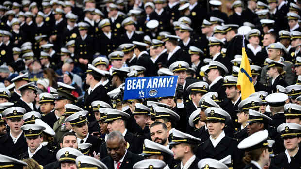 Dec 9, 2023; Foxborough, Massachusetts, USA; Members of the Navy hold up a sign during the first half against the Army Black Knights at Gillette Stadium. Mandatory Credit: Eric Canha-USA TODAY Sports