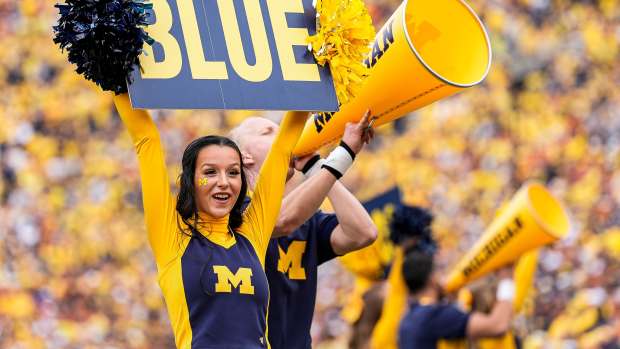 Michigan cheerleaders lead chants of Go Blue during the first half against Texas at Michigan Stadium in Ann Arbor on Saturday, September 7, 2024. © Junfu Han / USA TODAY NETWORK