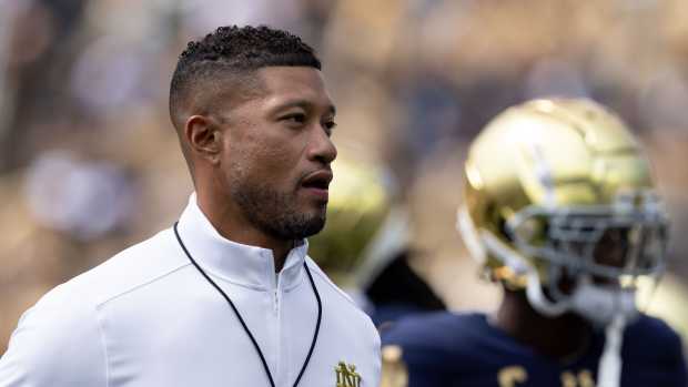 Notre Dame head coach Marcus Freeman jogs the field during warm-ups before a NCAA college football game between Notre Dame and Northern Illinois at Notre Dame Stadium on Saturday, Sept. 7, 2024, in South Bend.