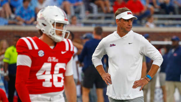 Sep 21, 2024; Oxford, Mississippi, USA; Mississippi Rebels head coach Lane Kiffin watches during warm ups prior to the game against the Georgia Southern Eagles at Vaught-Hemingway Stadium. Mandatory Credit: Petre Thomas-Imagn Images