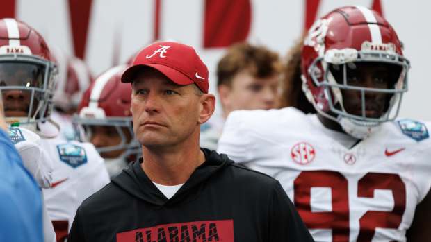 Dec 31, 2024; Tampa, FL, USA; Alabama Crimson Tide head coach Kalen DeBoer looks on before running onto the field before a game against the Michigan Wolverines at Raymond James Stadium. Mandatory Credit: Matt Pendleton-Imagn Images