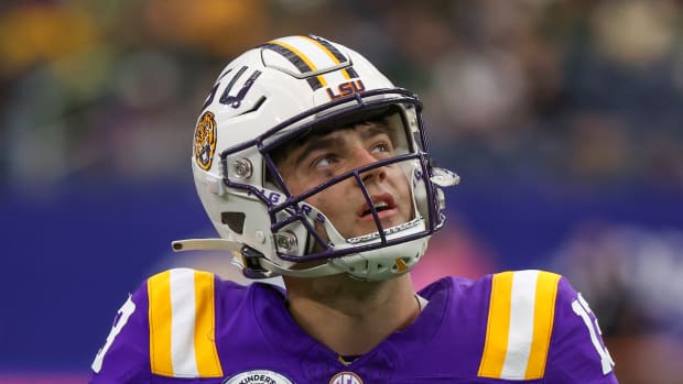 Dec 31, 2024; Houston, TX, USA; LSU Tigers quarterback Garrett Nussmeier (13) looks at the scoreboard during an official's time-out against the Baylor Bears in the second quarter at NRG Stadium. Mandatory Credit: Thomas Shea-Imagn Images
