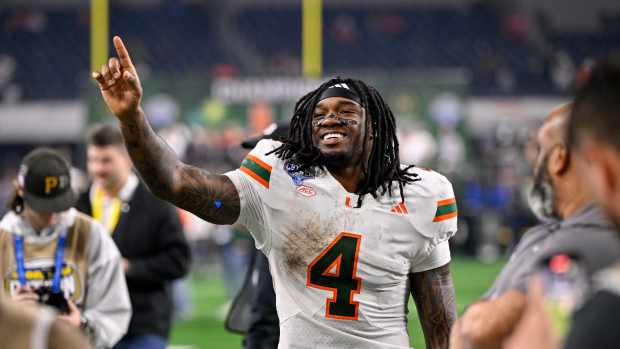 Dec 31, 2025; Arlington, TX, USA; Miami Hurricanes running back Mark Fletcher Jr. (4) walks off the field after the 2025 Cotton Bowl and quarterfinal game of the College Football Playoff at AT&T Stadium. Mandatory Credit: Jerome Miron-Imagn Images