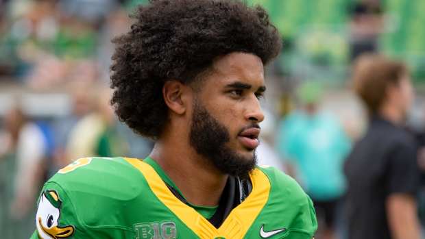 Oregon quarterback Dante Moore warms up as the Oregon Ducks host the Oklahoma State Cowboys on Sept. 6, 2025, at Autzen Stadium in Eugene, Oregon.