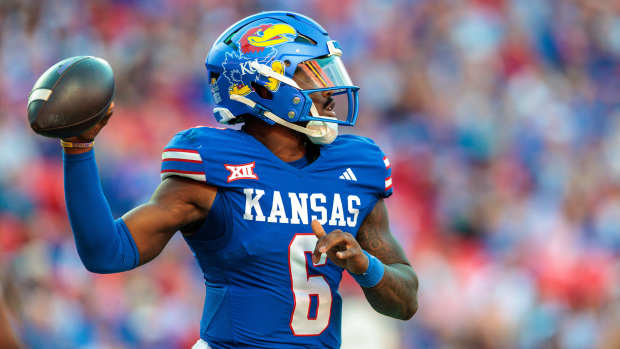 Oct 19, 2024; Kansas City, Missouri, USA; Kansas Jayhawks quarterback Jalon Daniels (6) passes the ball against the Houston Cougars during the third quarter at GEHA Field at Arrowhead Stadium. Mandatory Credit: William Purnell-Imagn Images