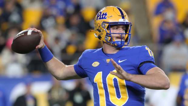Nov 9, 2024; Pittsburgh, Pennsylvania, USA; Pittsburgh Panthers quarterback Eli Holstein (10) passes against the Virginia Cavaliers during the first quarter at Acrisure Stadium. Mandatory Credit: Charles LeClaire-Imagn Images