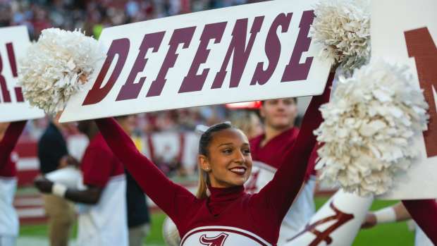 Nov 16, 2024; Tuscaloosa, Alabama, USA; Alabama Crimson Tide cheerleaders cheer for their team during the fourth quarter at Bryant-Denny Stadium. Mandatory Credit: Will McLelland-Imagn Images