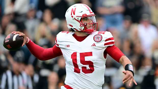 Sep 28, 2024; West Lafayette, Indiana, USA; Nebraska Cornhuskers quarterback Dylan Raiola (15) throws a pass against the Purdue Boilermakers during the first quarter at Ross-Ade Stadium.