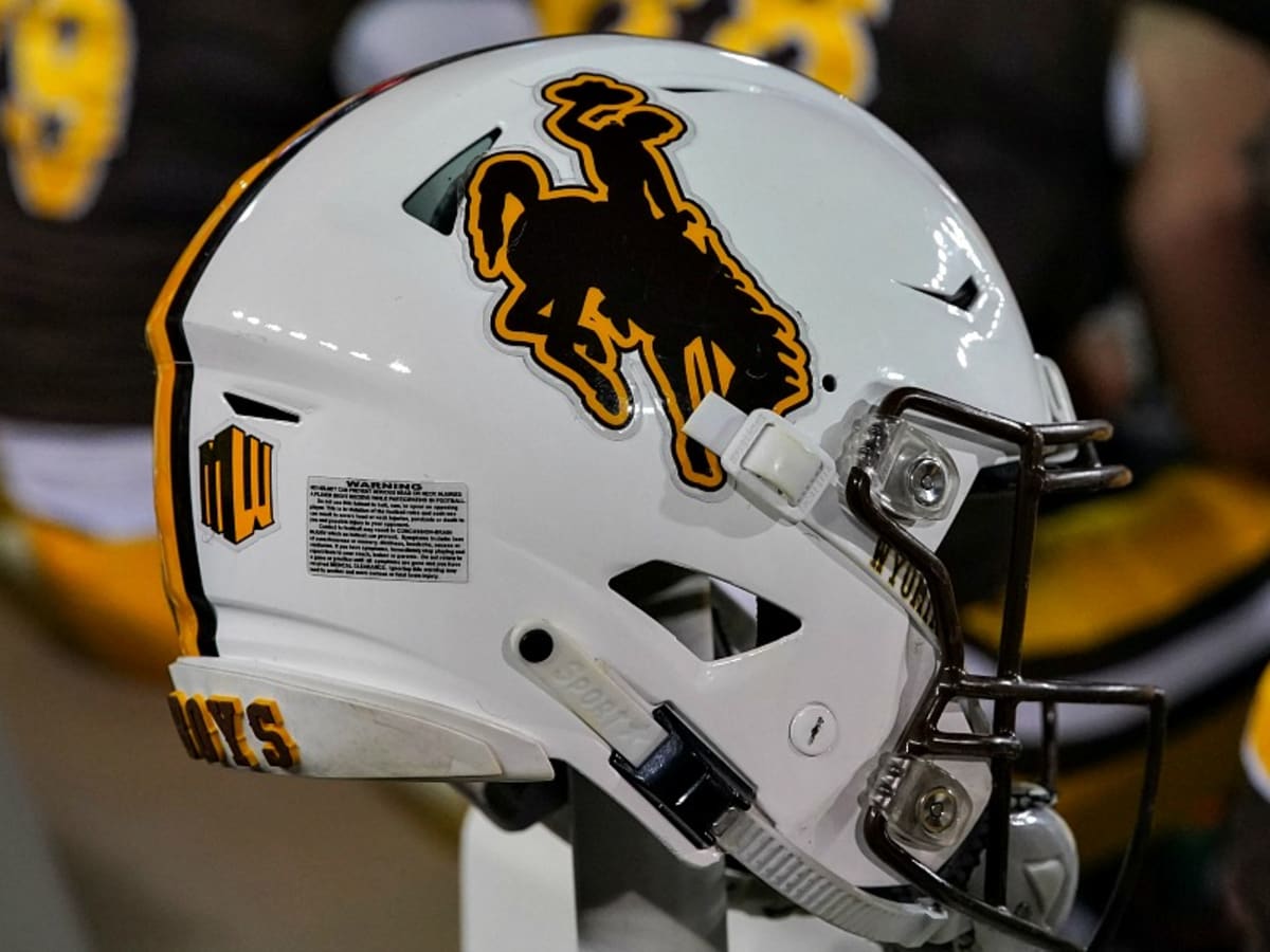 Wyoming Cowboys  Football helmets, College football helmets, Sports helmet