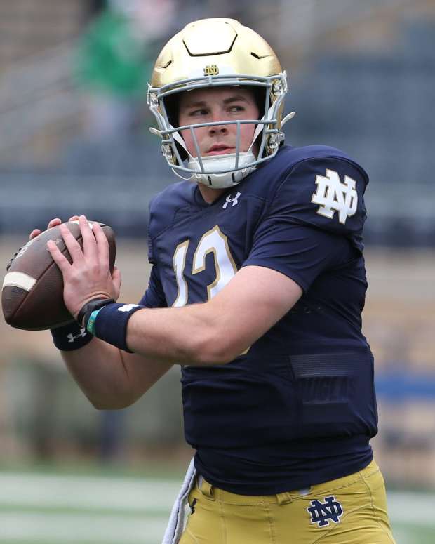 Notre Dame quarterback Riley Leonard (13) who is hurt, dresses and throws some pre-game passes with fellow quarterbacks Saturday, April 20, 2024, at the annual Notre Dame Blue-Gold spring football game at Notre Dame Stadium in South Bend. © MANDATORY CREDIT GREG SWIERCZ / USA TODAY NETWORK