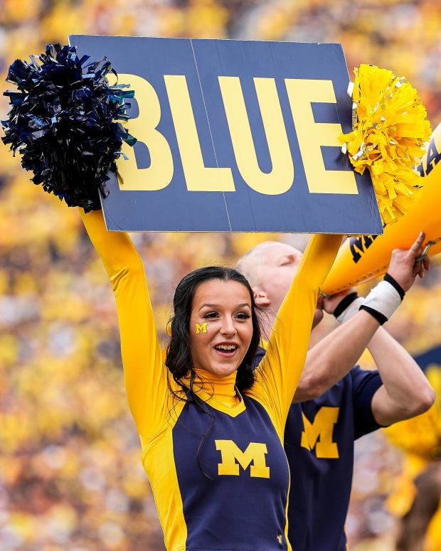 Michigan cheerleaders lead chants of Go Blue during the first half against Texas at Michigan Stadium in Ann Arbor on Saturday, September 7, 2024. © Junfu Han / USA TODAY NETWORK