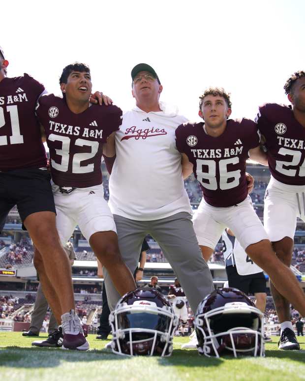 Sep 7, 2024; College Station, Texas, USA; Texas A&M Aggies head coach Mike Elko celebrates a 52-10 win against the McNeese State Cowboys at Kyle Field. Mandatory Credit: Dustin Safranek-Imagn Images