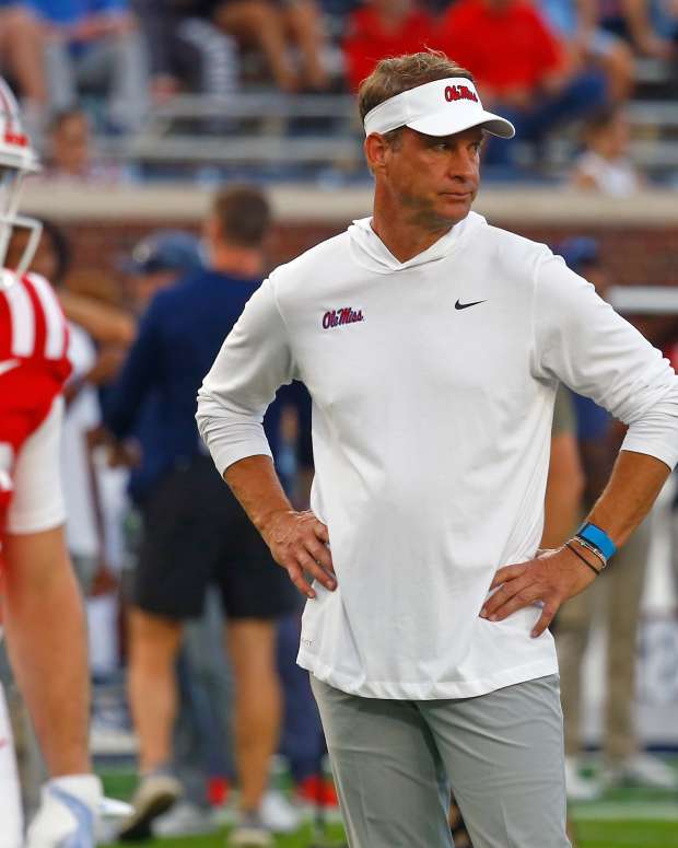 Sep 21, 2024; Oxford, Mississippi, USA; Mississippi Rebels head coach Lane Kiffin watches during warm ups prior to the game against the Georgia Southern Eagles at Vaught-Hemingway Stadium. Mandatory Credit: Petre Thomas-Imagn Images