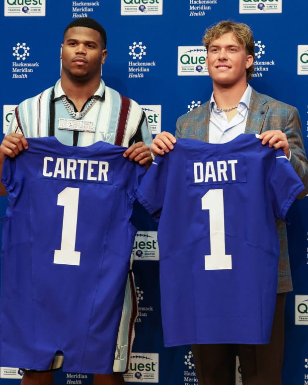 Apr 25, 2025; East Rutherford, NJ, US; New York Giants first round draft picks, Abdul Carter and Jaxson Dart pose for photos prior to the start of the press conference. Mandatory Credit: Thomas Salus-Imagn Images
