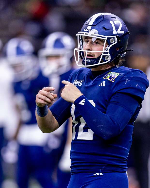 Dec 19, 2024; New Orleans, LA, USA; Georgia Southern Eagles quarterback JC French (12) looks over at the sidelines against the Sam Houston State Bearkats during the first half at Caesars Superdome. Mandatory Credit: Stephen Lew-Imagn Images