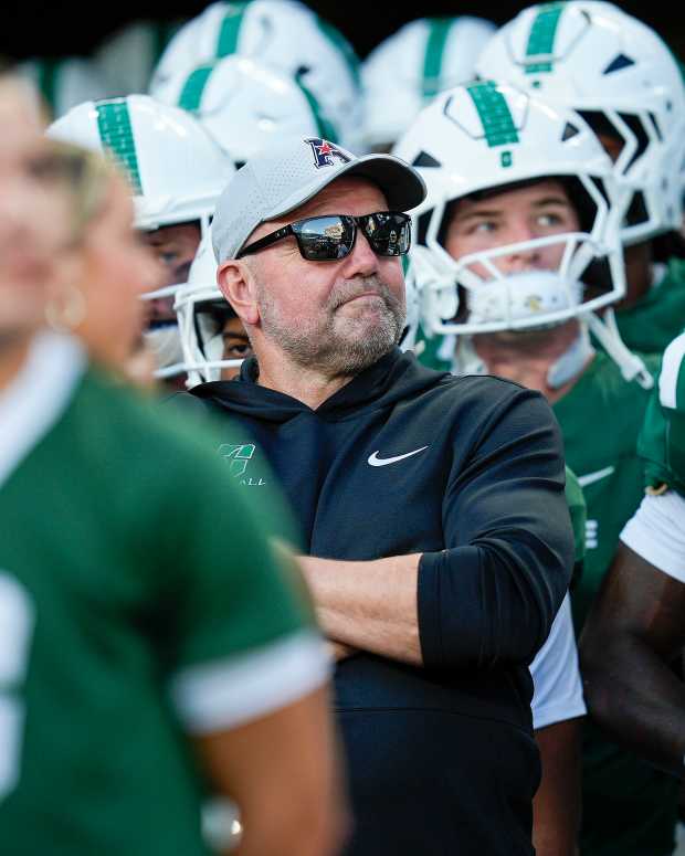 Aug 29, 2025; Charlotte, North Carolina, USA; Charlotte 49ers head coach Tim Albin and his team wait to take the field during the first quarter against the Appalachian State Mountaineers at Bank of America Stadium. Mandatory Credit: Jim Dedmon-Imagn Images