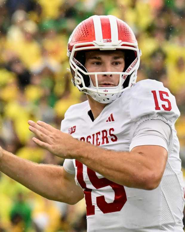 Oct 11, 2025; Eugene, Oregon, USA; Indiana Hoosiers quarterback Fernando Mendoza (15) prepares to throw the ball against the Oregon Ducks during the fourth quarter at Autzen Stadium. Mandatory Credit: Troy Wayrynen-Imagn Images
