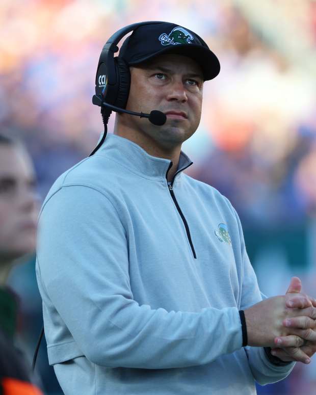 Dec 20, 2024; Tampa, FL, USA; Tulane Green Wave head coach Jon Sumrall looks on against the Florida Gators during the first quarter at Raymond James Stadium. Mandatory Credit: Kim Klement Neitzel-Imagn Images