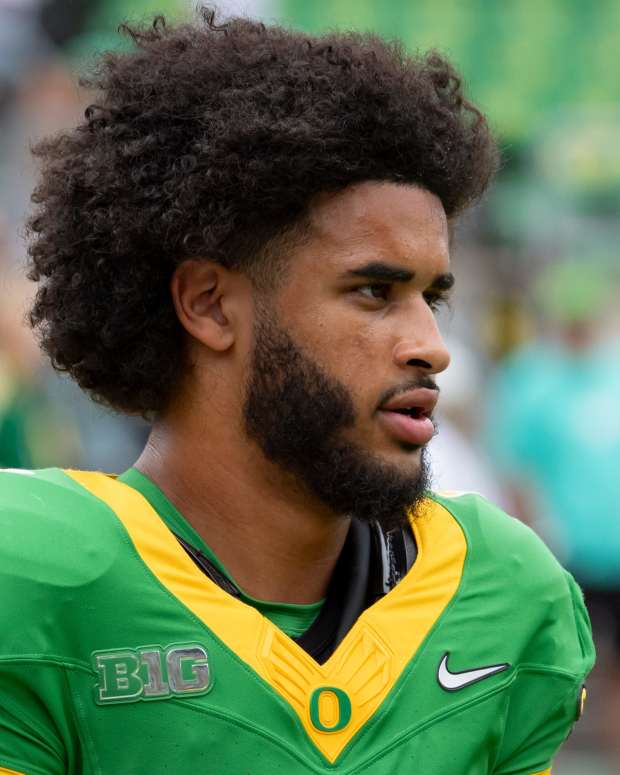 Oregon quarterback Dante Moore warms up as the Oregon Ducks host the Oklahoma State Cowboys on Sept. 6, 2025, at Autzen Stadium in Eugene, Oregon.