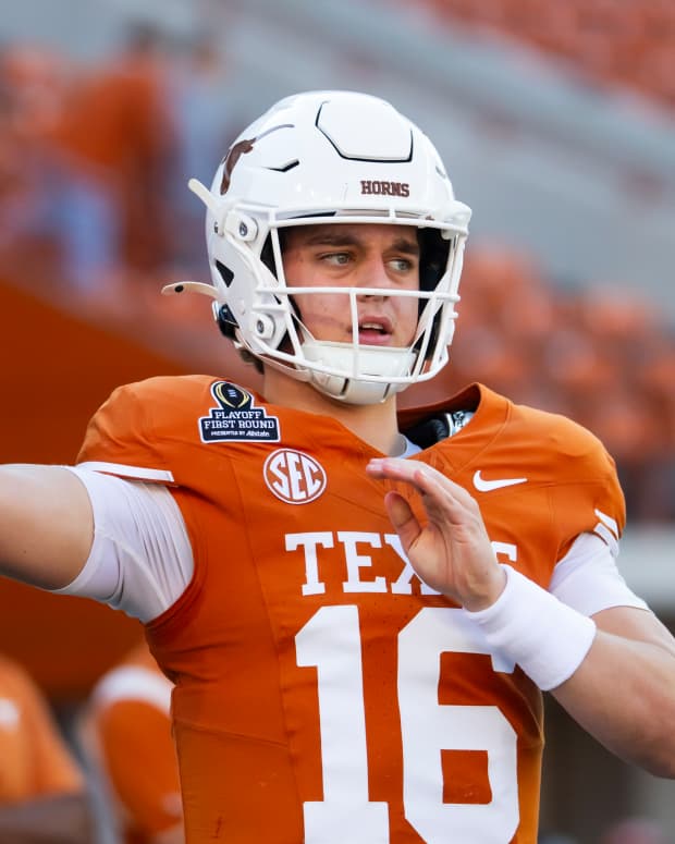 Dec 21, 2024; Austin, Texas, USA; Texas Longhorns quarterback Arch Manning (16) against the Clemson Tigers during the CFP National playoff first round at Darrell K Royal-Texas Memorial Stadium. Mandatory Credit: Mark J. Rebilas-Imagn Images