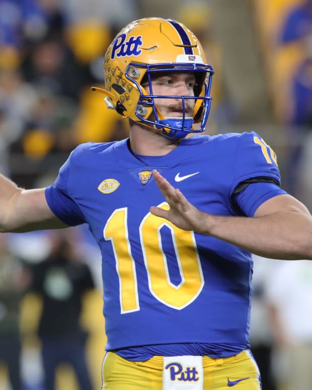 Nov 9, 2024; Pittsburgh, Pennsylvania, USA; Pittsburgh Panthers quarterback Eli Holstein (10) passes against the Virginia Cavaliers during the first quarter at Acrisure Stadium. Mandatory Credit: Charles LeClaire-Imagn Images