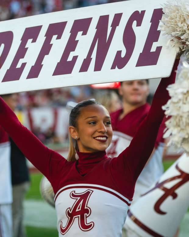 Nov 16, 2024; Tuscaloosa, Alabama, USA; Alabama Crimson Tide cheerleaders cheer for their team during the fourth quarter at Bryant-Denny Stadium. Mandatory Credit: Will McLelland-Imagn Images