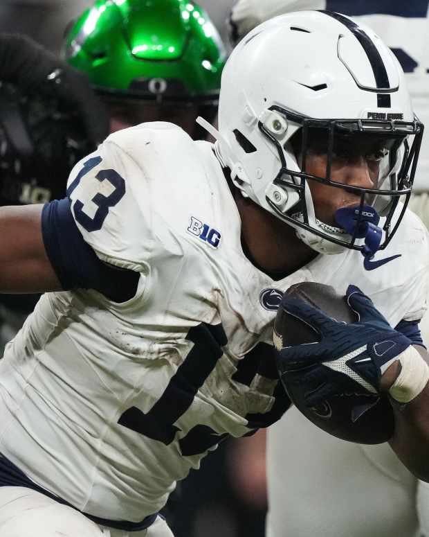 Penn State Nittany Lions running back Kaytron Allen (13) rushes up the field Saturday, Dec. 7, 2024, during the Big Ten Championship game at Lucas Oil Stadium in Indianapolis. The Oregon Ducks defeated the Penn State Nittany Lions, 45-37. © Grace Hollars/IndyStar / USA TODAY NETWORK via Imagn Images