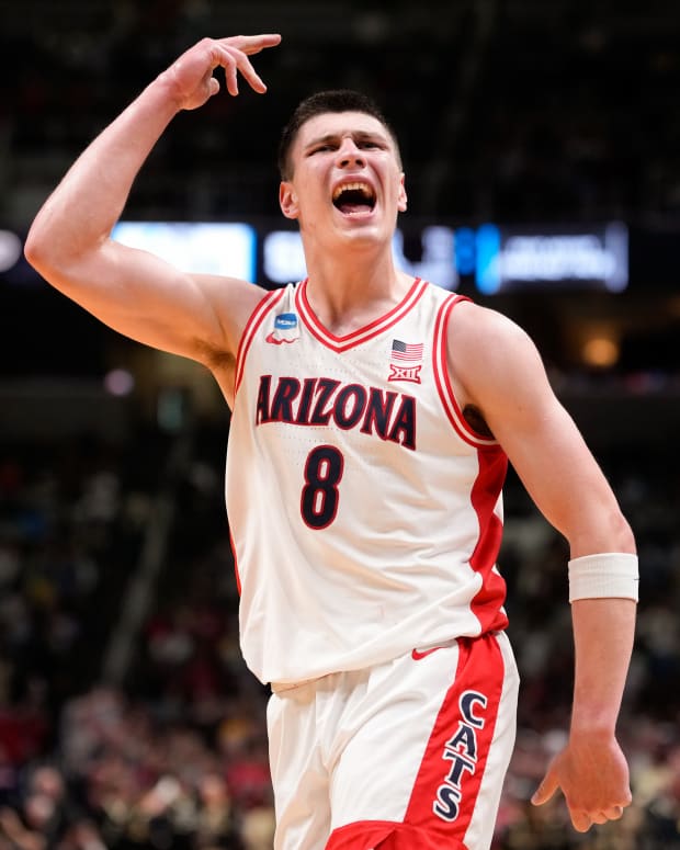 Mar 28, 2026; San Jose, CA, USA; Arizona Wildcats forward Ivan Kharchenkov (8) celebrates in the second half against the Purdue Boilermakers during an Elite Eight game of the West Regional of the men's 2026 NCAA Tournament at SAP Center. Mandatory Credit: Kyle Terada-Imagn Images