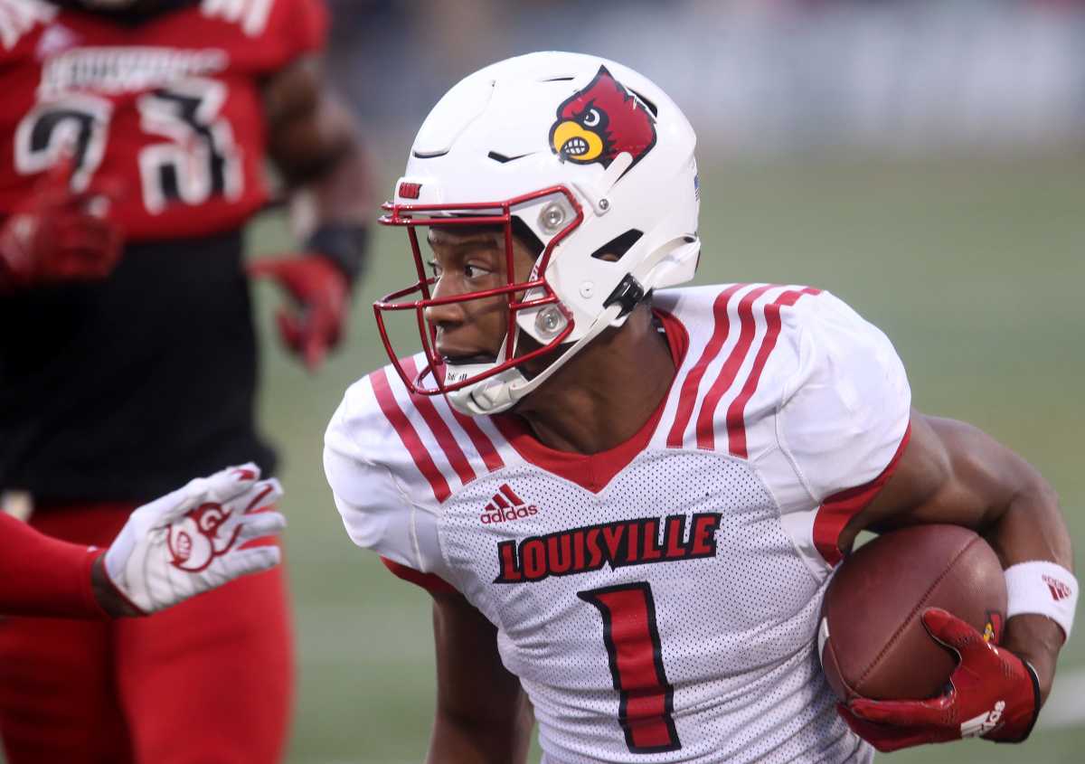 Lamar Jackson Louisville Cardinals Unsigned White Jersey Warming Up vs. NC  State Photograph