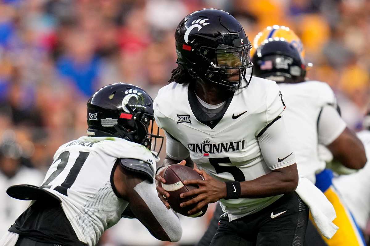 Cincinnati Bearcats' helmets came off several times at Arkansas